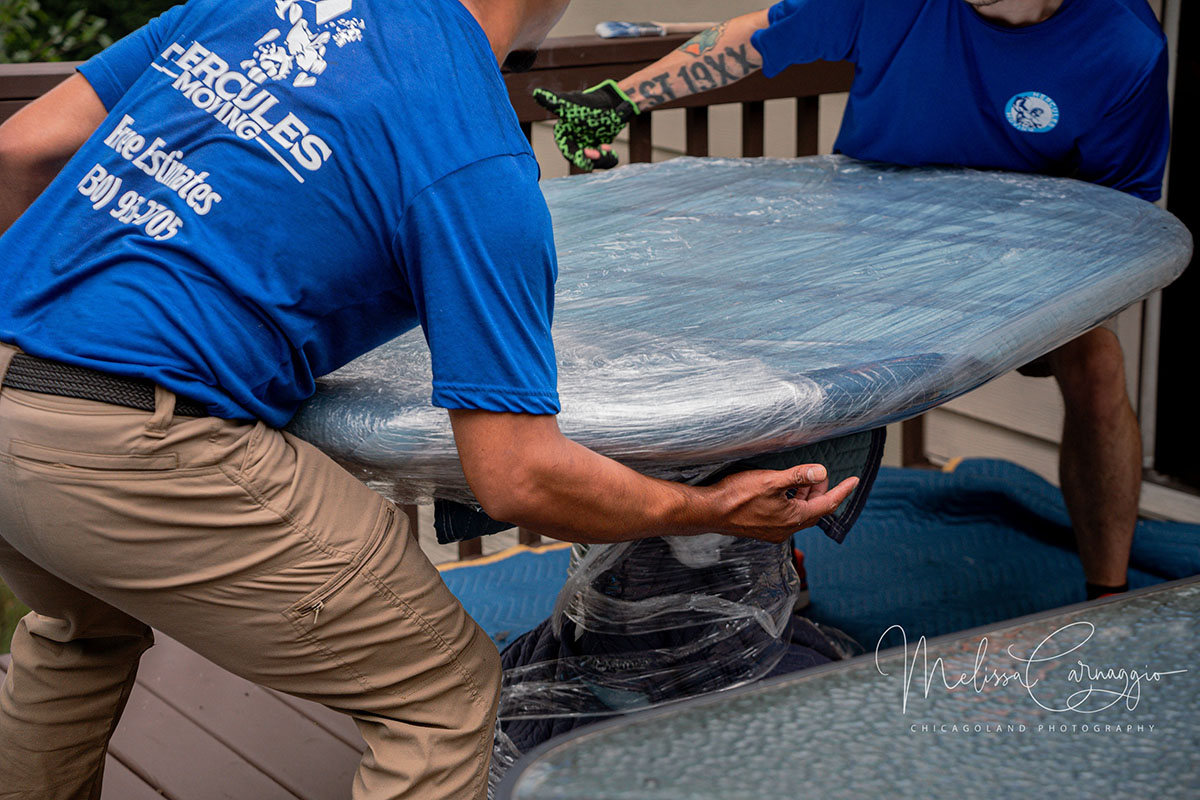 movers carrying a table